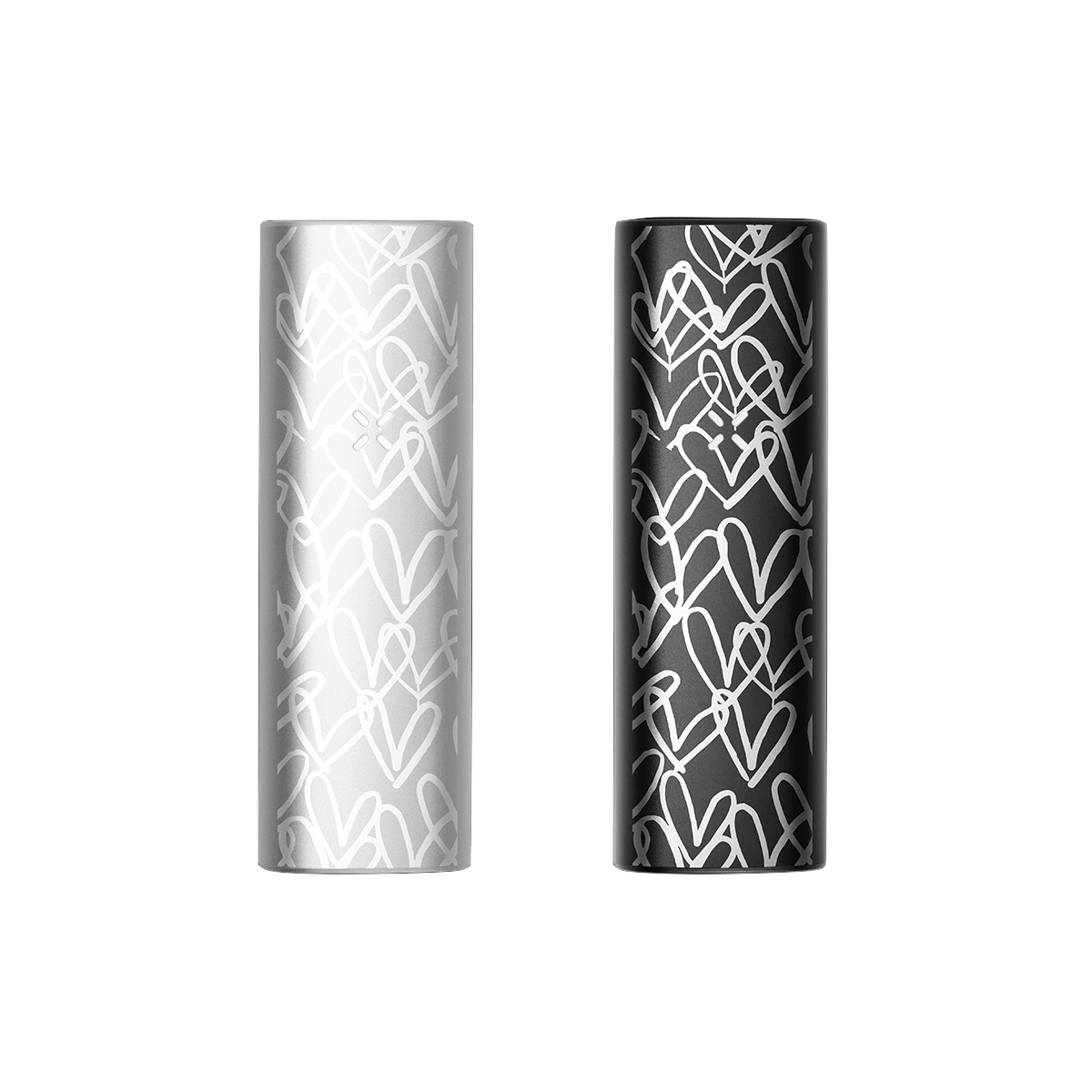 Zwei PAX MINI Vaporizer mit James Goldcrown Design in Onyx Schwarz und Weiß, verziert mit künstlerischen Herzmotiven.