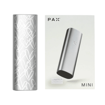 PAX MINI Vaporizer in Silber mit Goldcrown-Herzen Design und Verpackung, modern und leistungsstark für deine stilvolle Dampferfahrung.